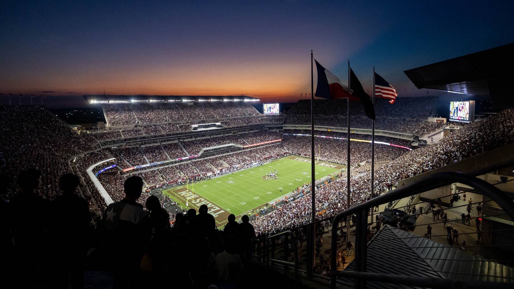 A packed Kyle Field at sunset